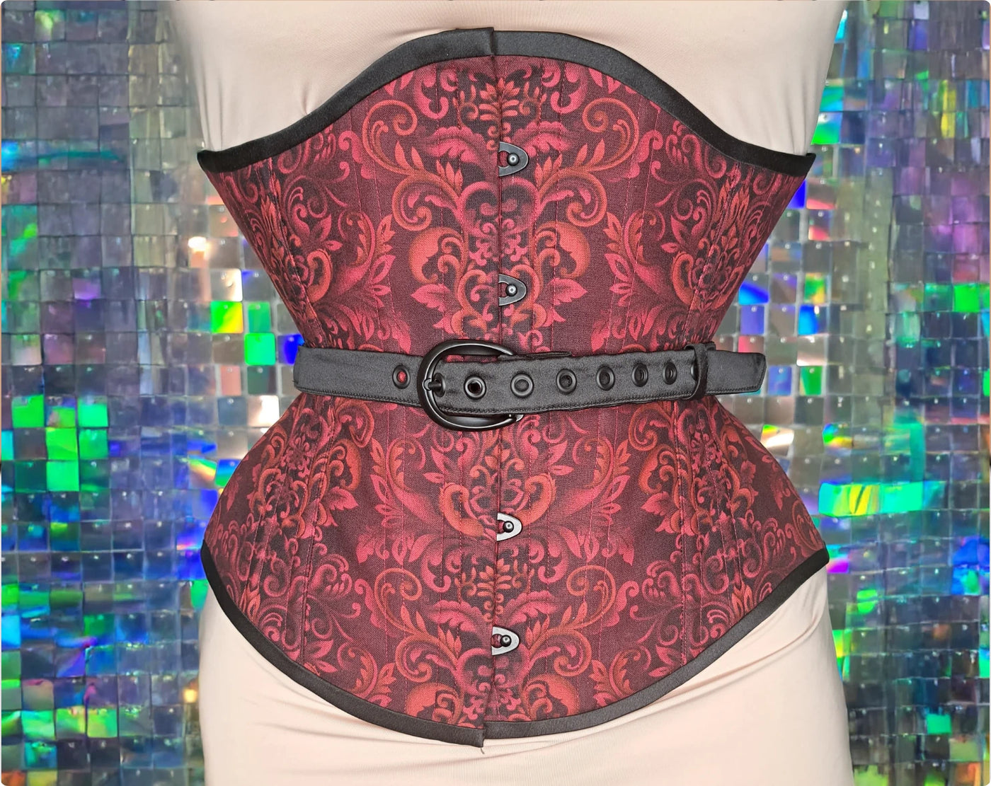 Printed cotton underbust corset with busk, fan lacing and contrasting accents — the finished corset